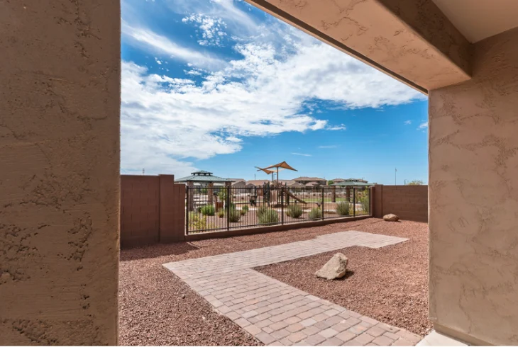 Covered patio looking out to the backyard at Sunrise Haven Senior Homes